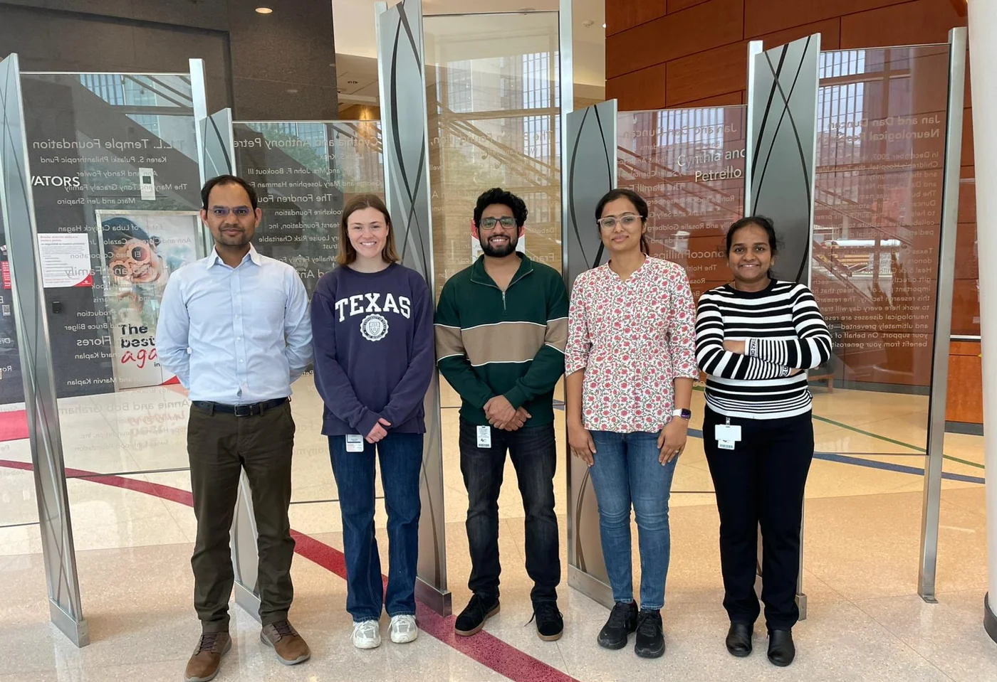 The Laboratory of Lipids and Neurological Diseases team at the Texas Children's Hospital Feigin Tower — Shubham Singh (PI), Hanna Norwood, Femil J. Shajan, Jyotsna Shukla, and Srividhya Raja.